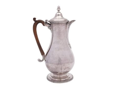 A George III silver coffee pot, maker Daniel Smith &amp; Robert Sharp, London, 1780: of ovoid form, with domed hinged lid sur