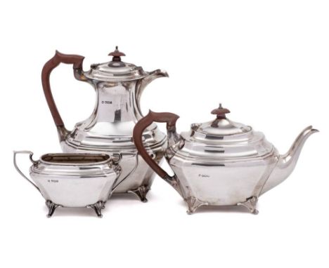 A George V  silver three-piece tea service, maker James Deakin &amp; Sons, Sheffield, 1922: of barge-shaped outline, raised o