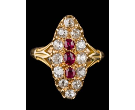A ruby and diamond marquise-shaped cluster ring: centring three oval rubies within a surround of round old, brilliant-cut dia