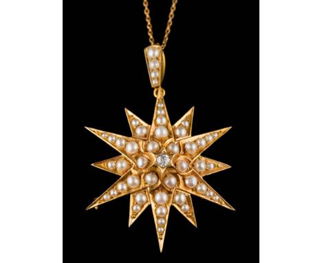 A 19th Century seed pearl and diamond star burst pendant: centring a round old brilliant-cut diamond, approximately 37mm diam