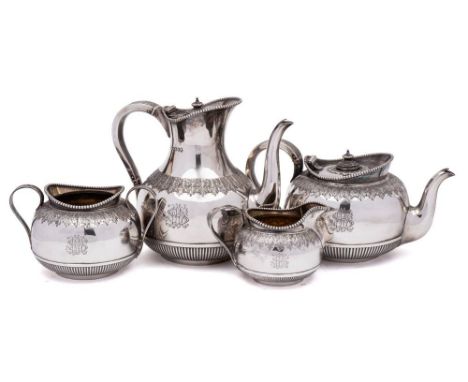 A Victorian silver  four-piece tea and coffee service, maker Martin, Hall &amp; Co, London, 1880: monogrammed, of squat circu