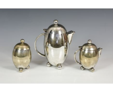 An unusual Art Deco design silver plate three piece bachelor tea service, of ovoid form, with spherical finials and feet, com