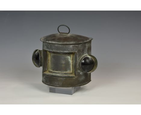 Maritime interest - A ship's navigation dual port-starboard light, of copper construction, with central curved widow and port