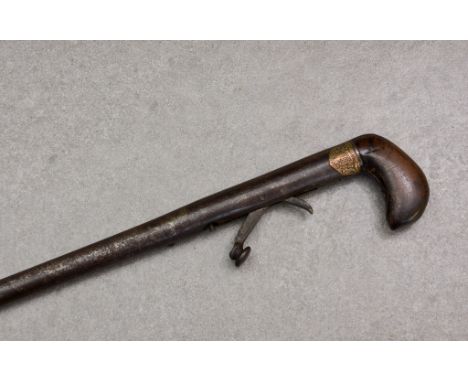 An English DAY'S PATENT underhammer walking stick gun, c.1860, 'DAY'S PATENT', having metal mounted ram rod, brass plaque, em