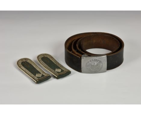 An original WWII German Army Third Reich belt and buckle, the brown leather belt with die struck aluminium buckle with "Gott 
