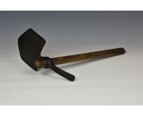 A WWI 1915 British Army issue entrenching tool, stamped to wooden handle with broad arrow and 1915, 16¾in. (42.5cm.) long. *T