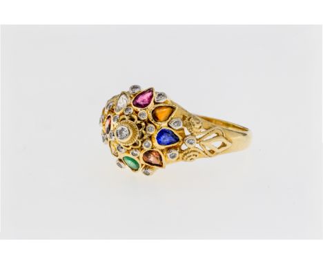 An 18ct yellow gold multi gem set dress ring, probably Indian, early to mid-20th century, of high, conical form, set with ros