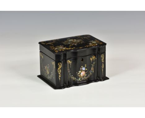 A Victorian papier-mache tea caddy, c.1860, of rectangular form with serpentine front, inlaid with mother of pearl, having fl