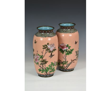 A pair of large Japanese cloisonné vases, Meiji period (1868-1912), ovoid form with waisted necks and everted rim, decorated 