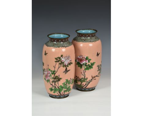 A pair of large Japanese cloisonné vases, Meiji period (1868-1912), ovoid form with waisted necks and everted rim, decorated 