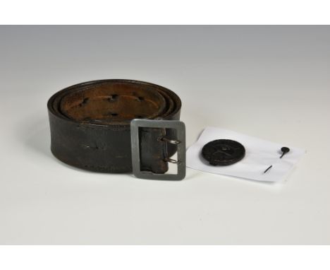 An original WWII German Officer belt with black wound badge and matching stick pin, the dark brown leather belt unmarked, 39i