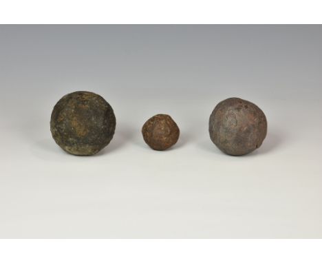 An English civil war exploding iron mortar / cannon ball, with pierced hole for fuse and shrapnel, 3lb?, diameter, 2 6/8in.; 