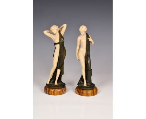 After Ferdinand Preiss (1882-1943), a pair of Art Deco style, simulated ivory semi nude classical female figures, stamped 'F.