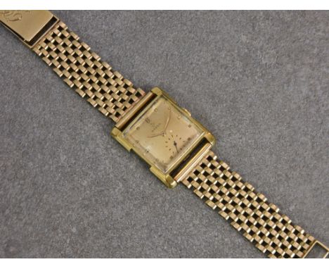 A vintage Omega yellow gold mid-century gents manual wrist watch, c.1951-52, with signed 17 jewel movement, no. 10839030, squ