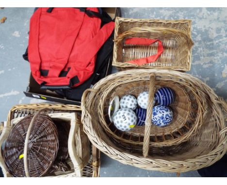 A good mixed lot to include a quantity of sun visors, rucksack, sporting bags, eight wicker baskets and a collection of six c