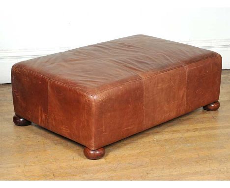 LEATHER POUFFE ON BUN FEET WIDTH 30 INCHES HEIGHT 16 INCHES LENGTH 48 INCHES