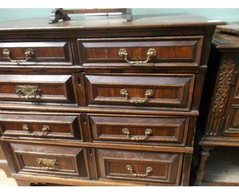 Oak chest of 2 short and 3 long drawers each with brass drop handles on bracket feet (38" x 23" x 36" high)