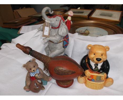 Ringtons bear tea caddy, smaller bear honey ornament, Swiss leather bound musical flask 'How Dry I am' and a musical circus e