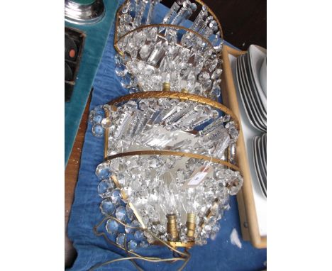 Pair of brass framed, mirrored backed dropped pear drop crystal electric light wall brackets (new)