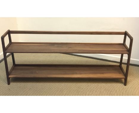 A modern walnut two tier open book shelf bearing label to underside "Agnes Long in walnut by Kay &amp; Stemmer" for SCP Ltd 1