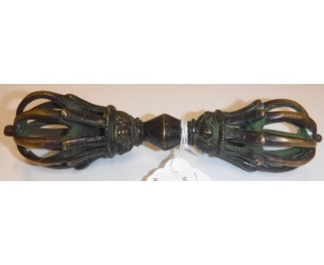 A 17th Century Sino-Tibetan bronze vajra of twin coronet type form with lotus leaf decoration, 16 cm long, 296 g