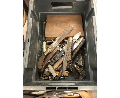 A box containing a collection of various pen knives, fruit and other folding knives including silver cased examples and other