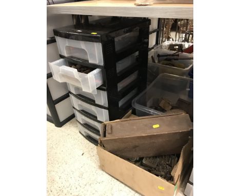 A large collection of various small hand tools including wire cutters, pliers, knives, scissors, nuts, bolts and tooling vari