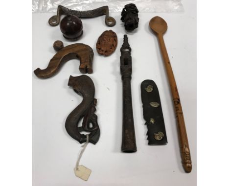 A collection of various objets de vertus including a 19th Century carved whistle stick handle, betel nut scent bottle, betel 