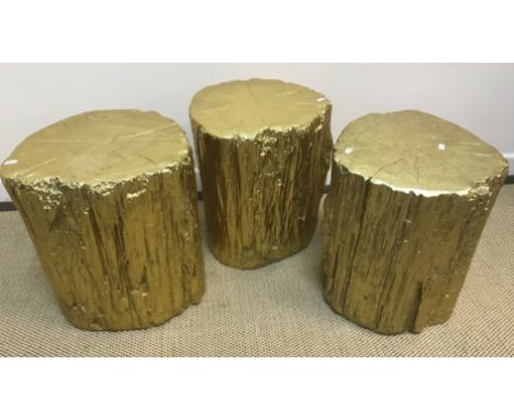 A set of three Kare design gold painted "tree trunk" stools approx. 38 cm diameter x 44 cm high