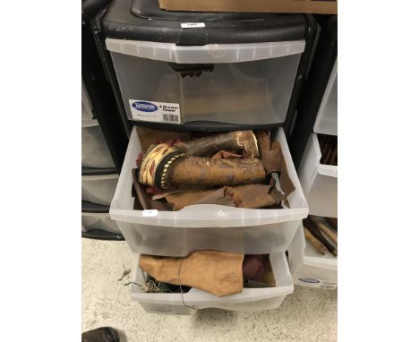A four drawer tool chest containing various restoration accoutrements including gold coloured wire braid, sections of leather