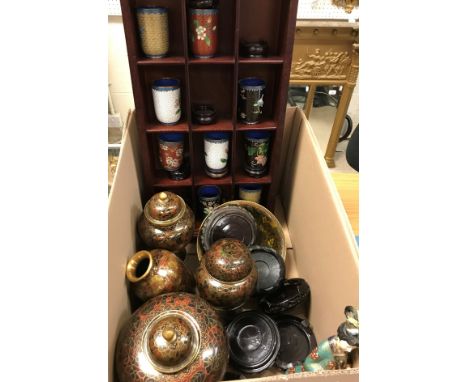 A collection of ten Chinese cloisonné beakers in various colours and floral designs, each 7.5 cm high, together with a collec