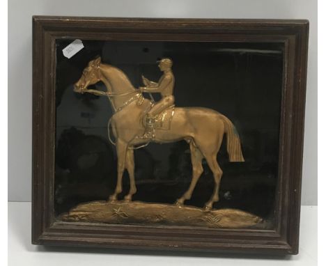 A framed and glazed gilt brass and engraved cast figure of "Jockey on horseback", 36 cm x 26 cm and an early 20th Century Fre