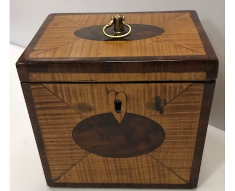 A late George III satinwood and mahogany banded single section tea caddy with oval medallion decoration 12.3cm wide x 11.2cm 