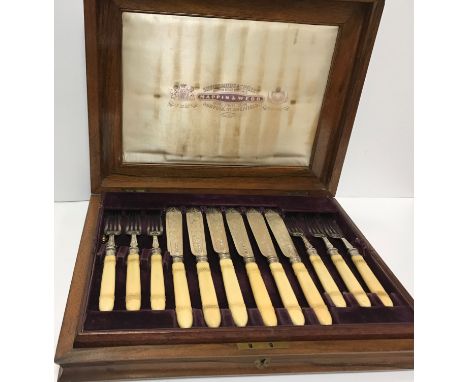 A cased set of twelve Victorian silver bladed and tined fish knives and forks (Sheffield 1874 by Mappin &amp; Webb) together 