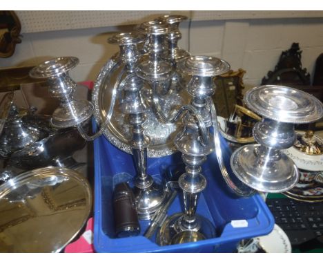 A pair of EPNS three branch two light table candelabra, 41.5 cm high, a plated salver, 28 cm wide, stainless steel hip flask,