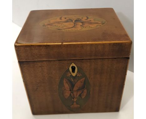A Regency mahogany and marquetry medallion inlaid single section tea caddy 12cm wide x 11.3cm highCondition ReportVarious kno