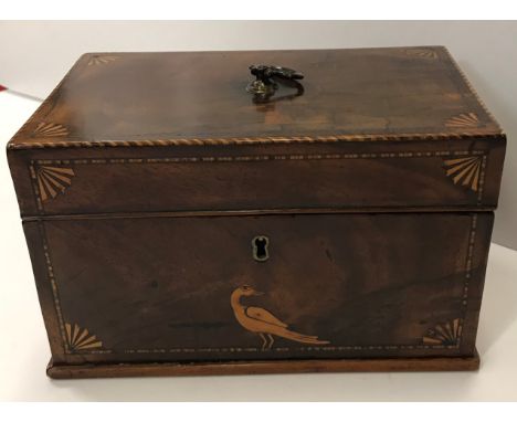 A late George III mahogany and fan marquetry inlaid barber pole strung tea caddy with bird marquetry inlaid motif to the fron