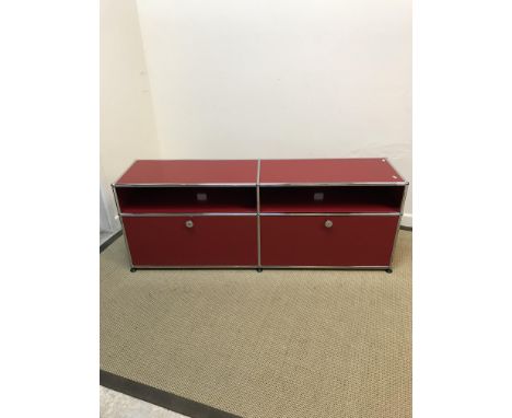 A USM ruby red and chrome Haller side unit with open shelving over a fall front compartment developed by Paul Scharer &amp; F