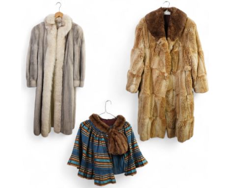 M. Caplan Furs Ottawa silver mink full length coat, another fur coat, a cape with fur trim and four vintage dresses