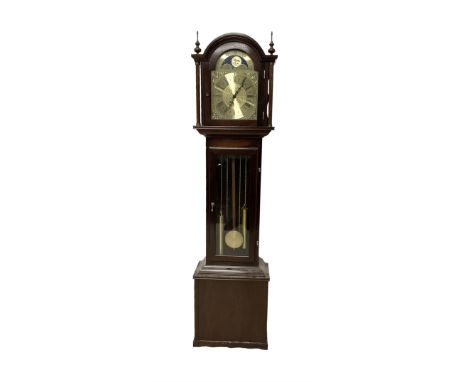 20th century - Westminster chime 8-day grandmother clock in a mahogany case, with a break arch top and brass finials, fully g