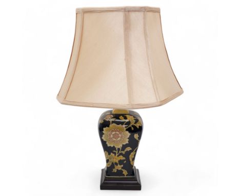 Oriental table lamp, decorated with pink and yellow flowers against a blue ground, on square base, with shade, H24cm excludin