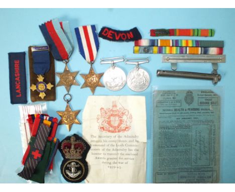 Five WWII medals, a Daily Sketch 'Medal of Honour', various ribbons, etc. and other items.