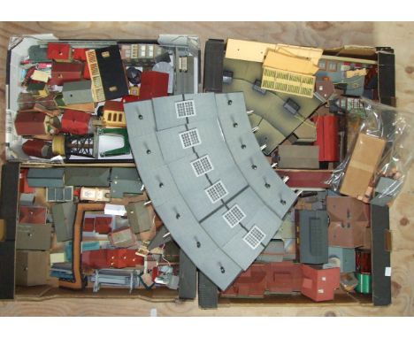 A large quantity of HO/OO gauge plastic trackside buildings, including a curved six-bay engine shed.