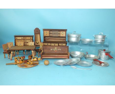 A quantity of Swiss-style wooden doll's furniture: dresser, clock, sideboard, settee, table and five chairs, also various alu