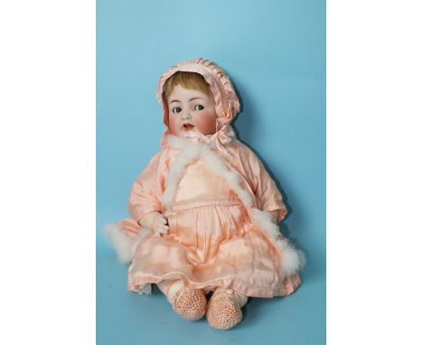 A Kammer &amp; Reinhardt, Simon &amp; Halbig bisque head baby doll with flirty brown eyes, moving tongue, sound box and compo