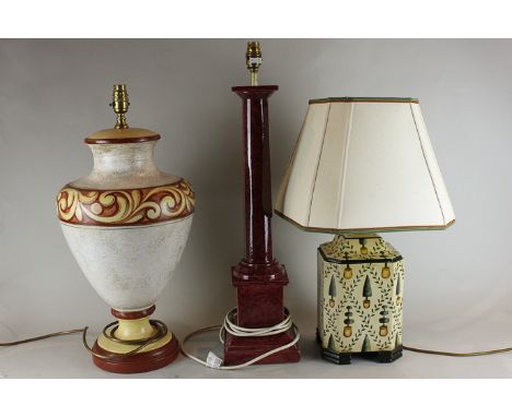 A ceramic table lamp, baluster shape with a band of scroll decoration, 56cm; a square shaped table lamp and a red glazed colu