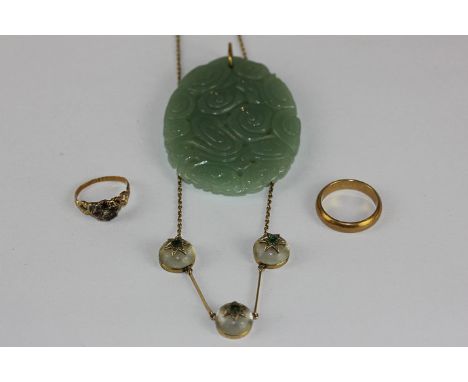 A rock crystal and gem set necklace, a carved and pierced Chinese jade pendant, a 19th century diamond and gem set ring, a Fr