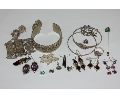 A Continental silver and paste flower head brooch; a silver and amethyst bangle and earrings, and various items of silver jew