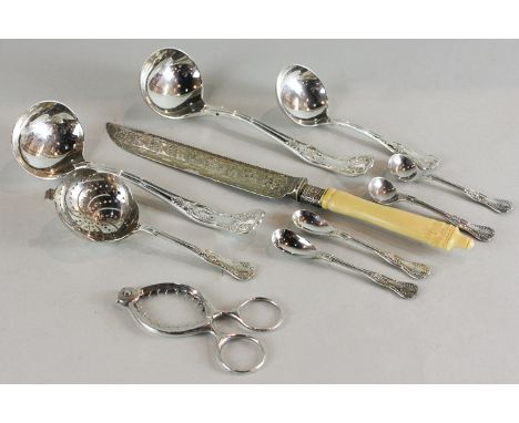 A pair of silver Kings pattern sauce ladles, a pair of mustard spoons and a pair of salt spoons, maker Charles Boyton and Son