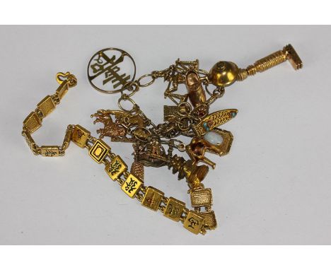 A oriental gold and enamel bracelet, 24gms, and a wire link charm bracelet, 30.1gms gross 